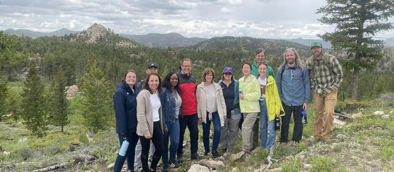 group photo in mountain landsca[e